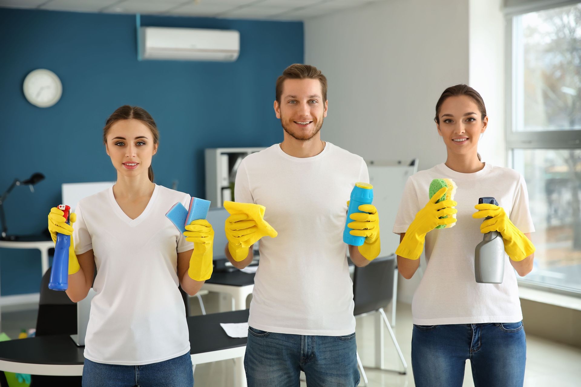 Team of janitors in office